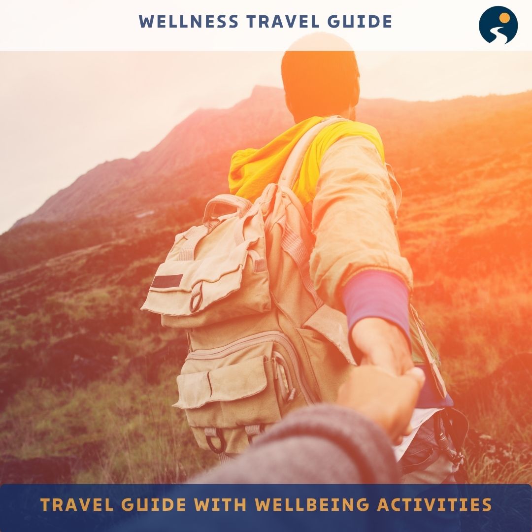 Person with backpack reaching out to another person in a mountainous landscape, with 'Wellness Travel Guide' text.